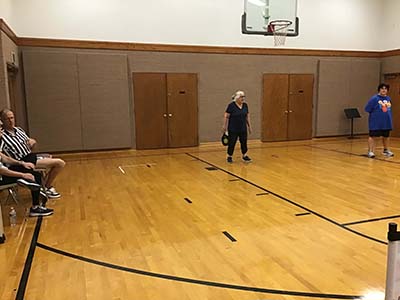 neighbors playing pickleball
