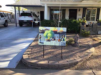 potluck sign in front of home hosting potluck dinner