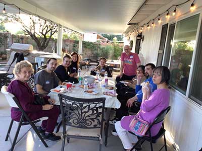 people at potluck dinner