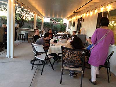 people at potluck dinner