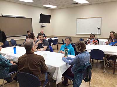 people at potluck dinner