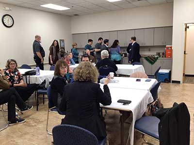 people at potluck dinner
