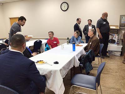 people at potluck dinner