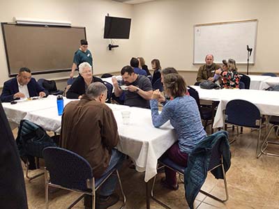 people at potluck dinner