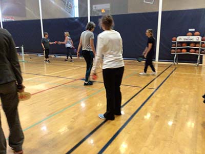 neighbors playing pickle ball