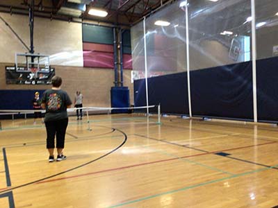 neighbors playing pickle ball