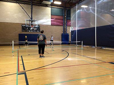 neighbors playing pickle ball
