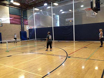 neighbors playing pickle ball