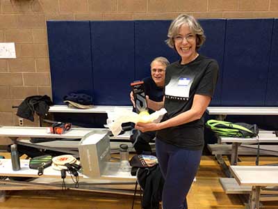 Julie holding outdoor pickleball balls