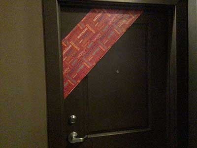 Happy Birthday banner on apartment door