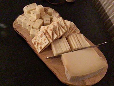 charcuterie board with cheese and crackers