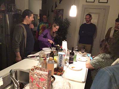 Tracy cutting birthday cake