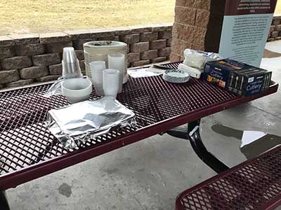 serving table with paper plates