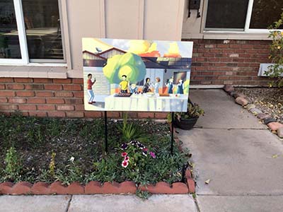 potluck dinner sign in front of house