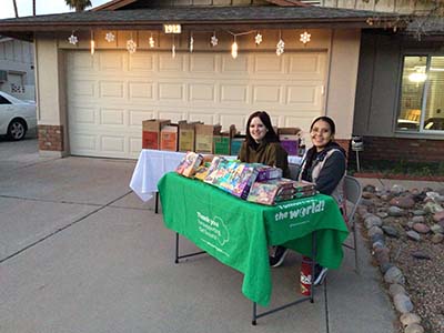 Girl Scouts selling Girl Scout cookies