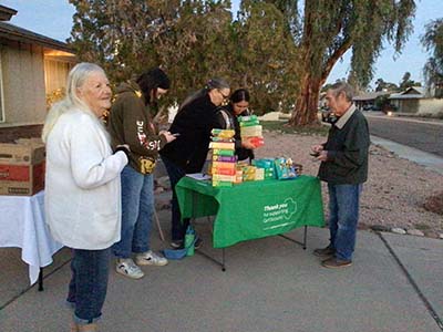 Girl Scouts selling Girl Scout cookies