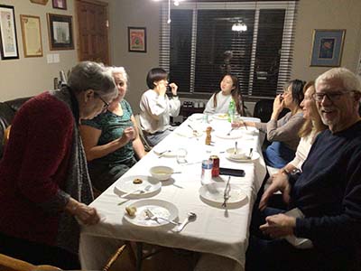 people at potluck dinner