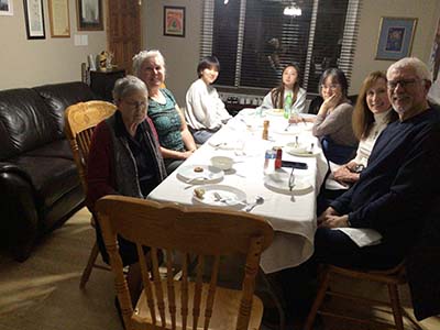people at potluck dinner