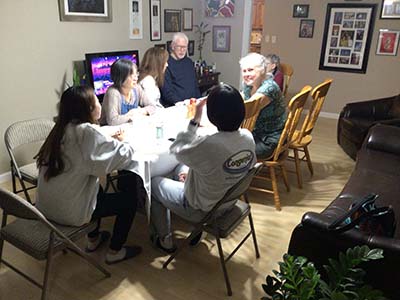 people at potluck dinner