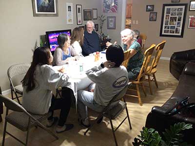 people at potluck dinner