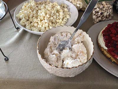 popcorn in bowl and ambrosia fruit salad