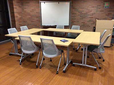 tables and whiteboard in Tempe Public Library