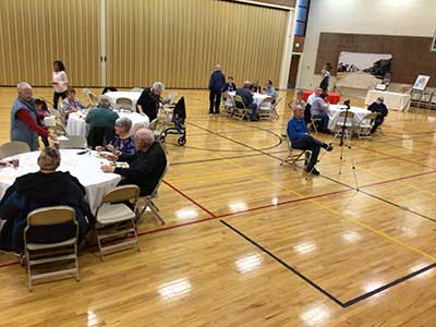 people at potluck dinner