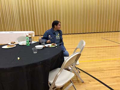 people at potluck dinner