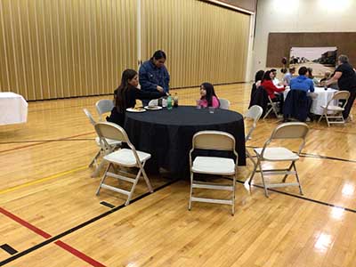 people at potluck dinner
