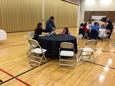 people at potluck dinner