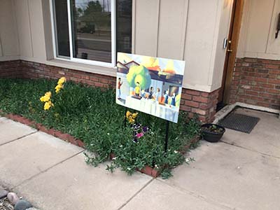potluck sign in front of home