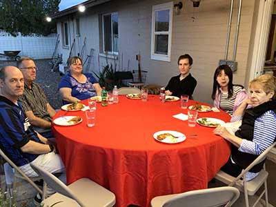 people at potluck dinner