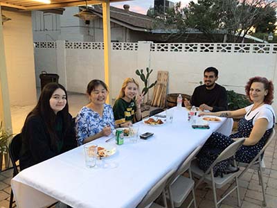 people at potluck dinner
