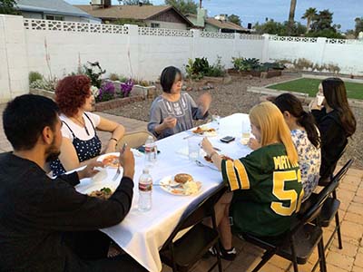 people at potluck dinner
