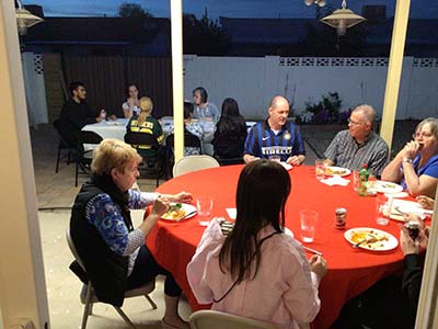 people at potluck dinner