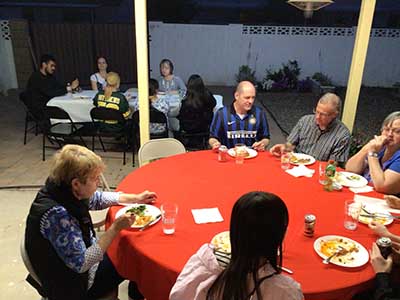 people at potluck dinner