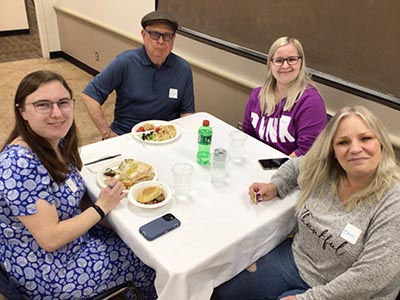 people at potluck dinner