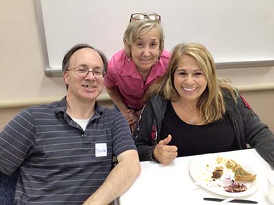 people at potluck dinner