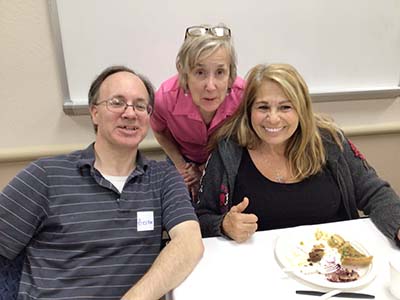 people at potluck dinner