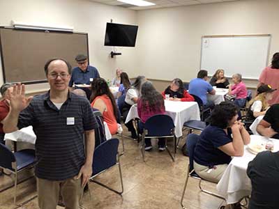 people at potluck dinner
