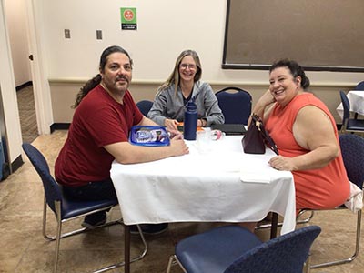people at potluck dinner