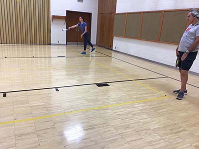 neighbors playing pickleball