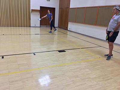 neighbors playing pickleball
