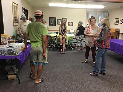 people at potluck dinner