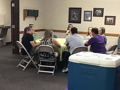 people at potluck dinner