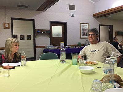 people at potluck dinner