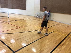 neighbors playing pickleball