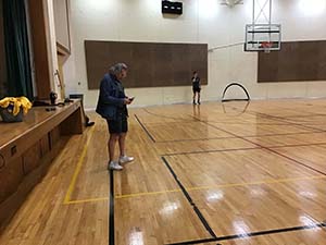 neighbors playing indoor soccer
