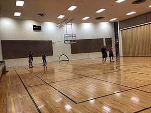 neighbors playing indoor soccer