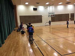 neighbors playing indoor soccer